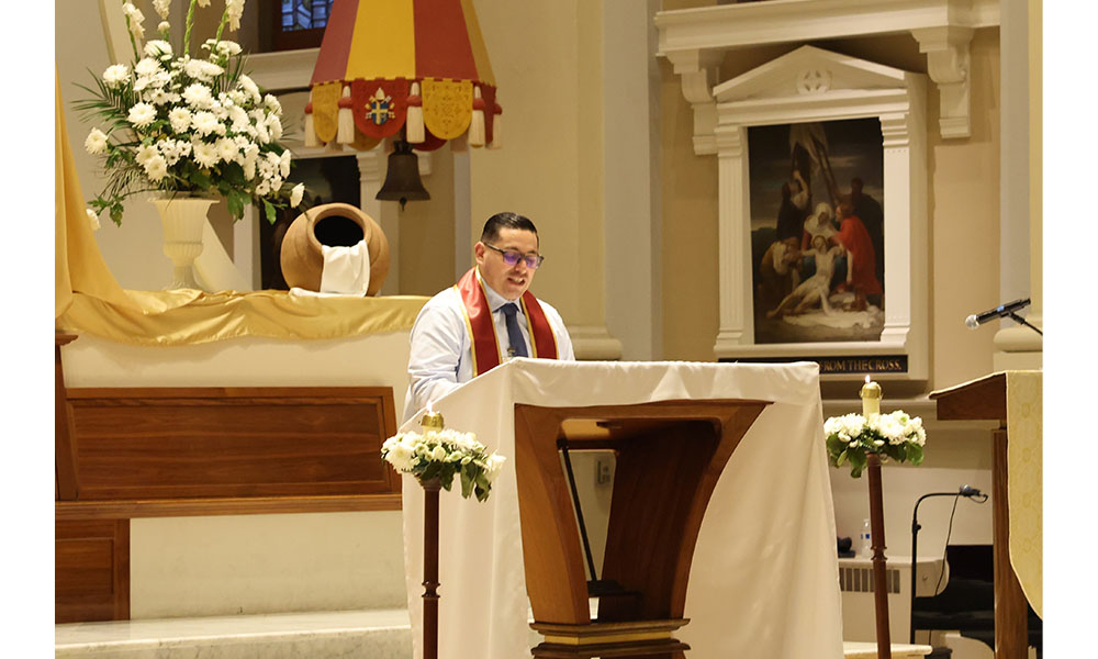 Salvador giving speech at podium