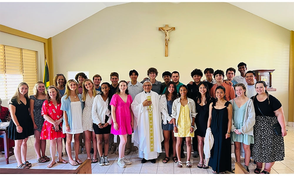 Groups of Students from Archbishop Mity with Father in Jamaica