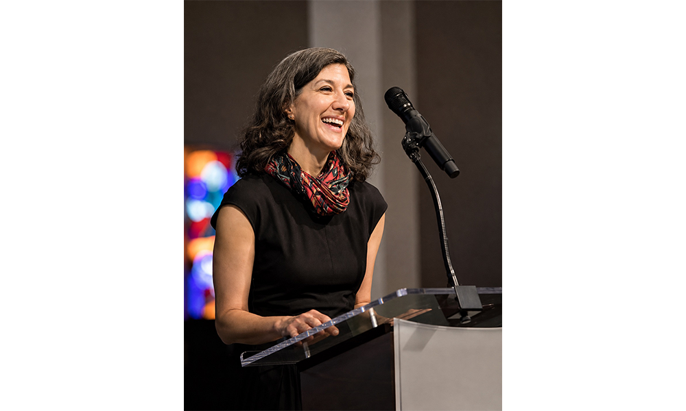 Julie Rubio Presents at Podium